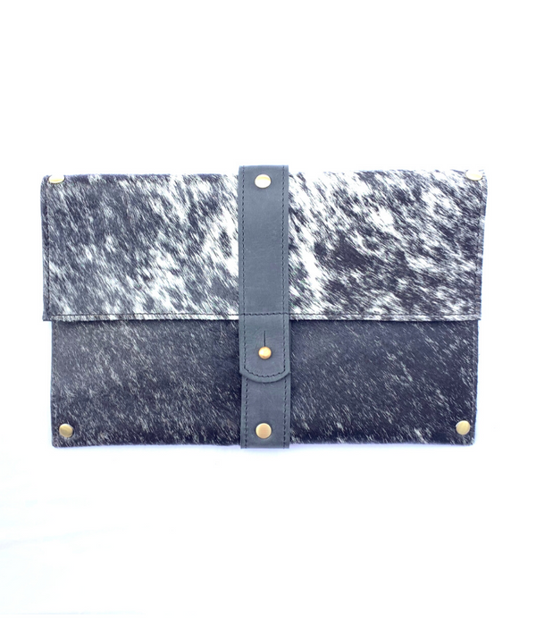RoHo's Purposeful cowhide clutch with black and hair with black finished leather accents
