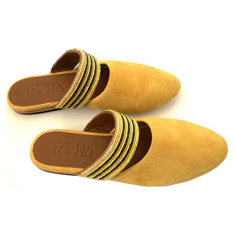 RoHo Fair Trade Handcrafted Beaded Suede Mustard Mule, Handmade by Artisans in Kenya from a side angle