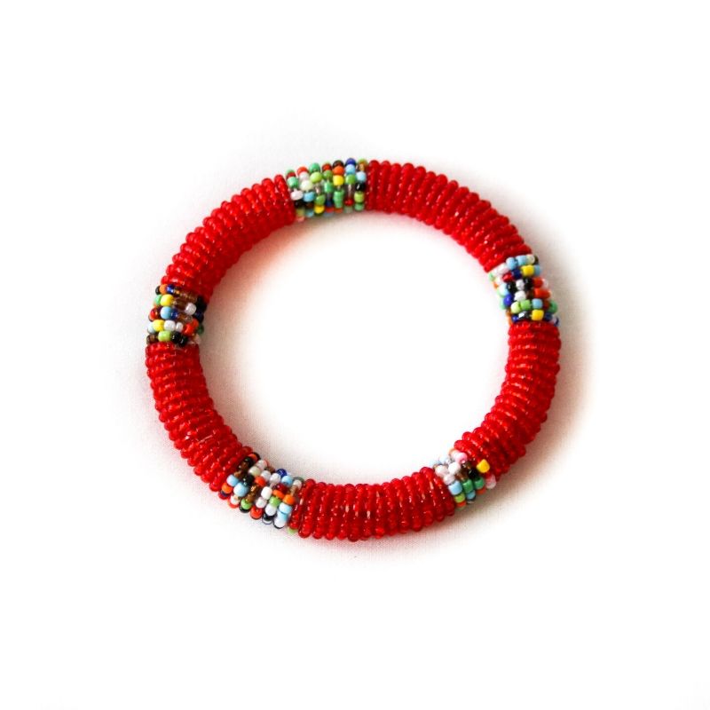 One impactful & Fair Trade RoHo Kenyan red small bangle with multicolored accents against a white background