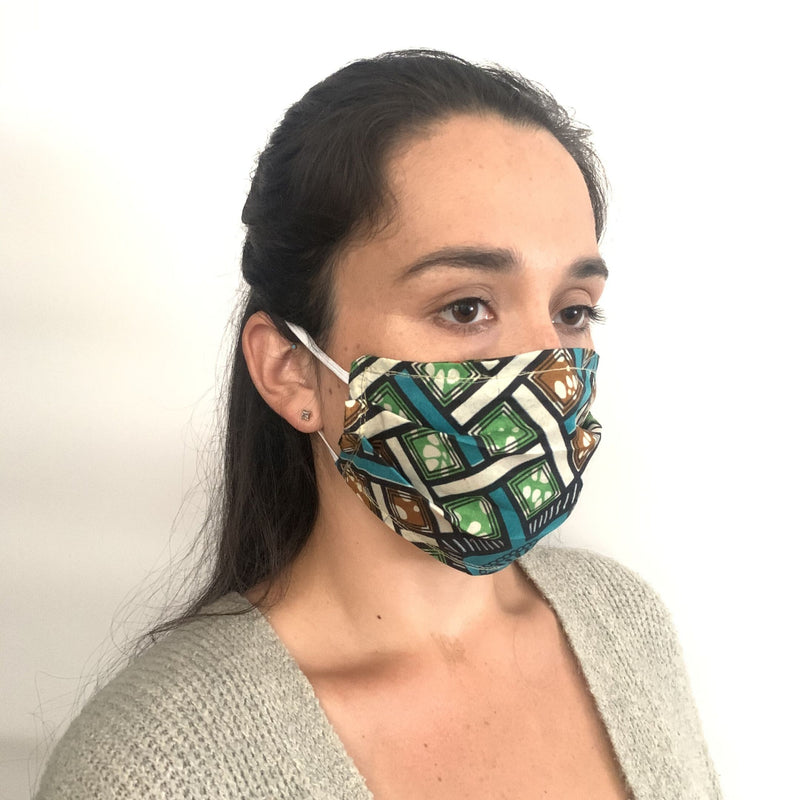 Kitenge African fabric face mask on a model, Helping a Health Professional