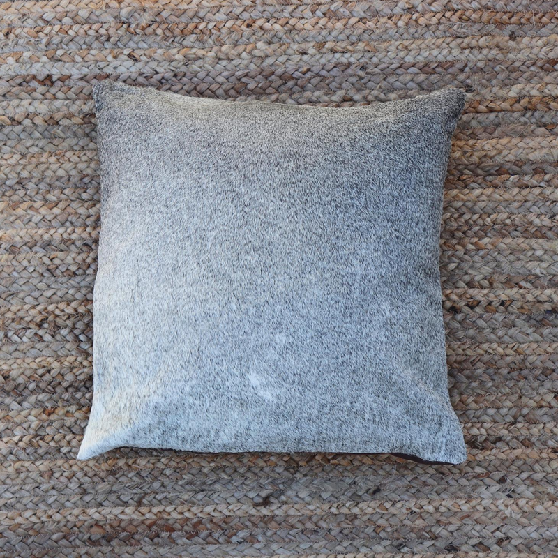 A handmade Kenyan RoHo grey cowhide accent pillow