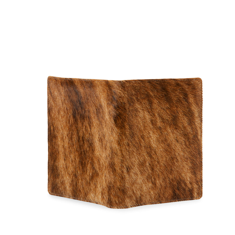 The back of RoHo's Handcrafted Beautiful Brindle Cowhide Journals Handmade by Artisans in Kenya