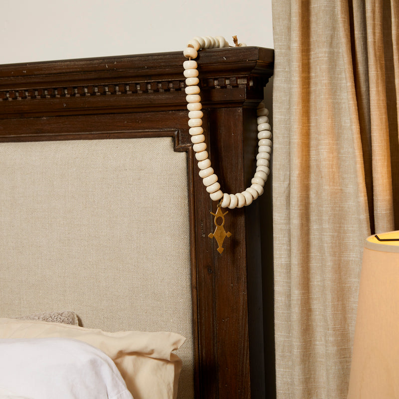 RoHo  - Asili Fair Trade Cow Bone Home Decor Beads with Pendant Next To A Bed